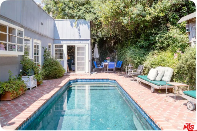 view of pool with a patio area