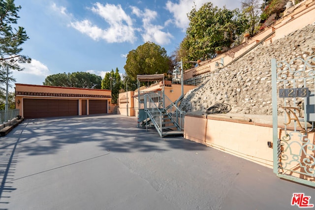 exterior space featuring a garage