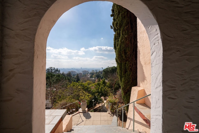 view of patio with a balcony