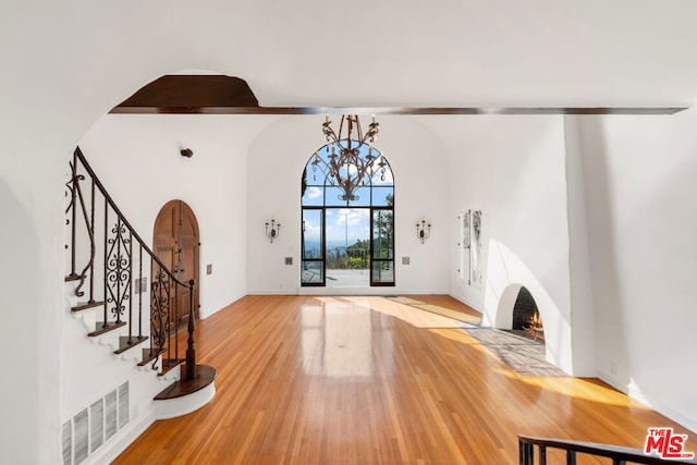 entrance foyer featuring wood-type flooring