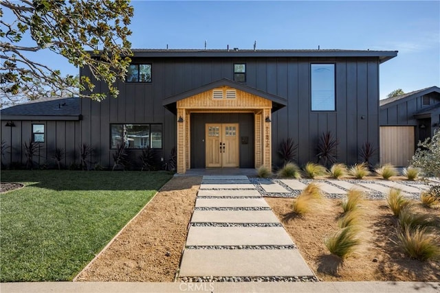 view of front of house with a front lawn