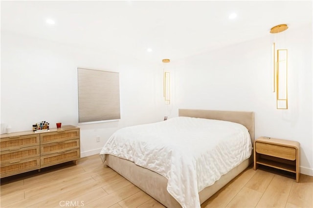 bedroom featuring wood-type flooring