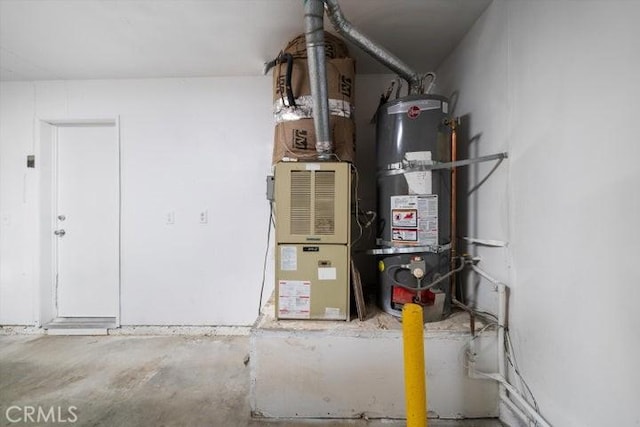 utility room with secured water heater