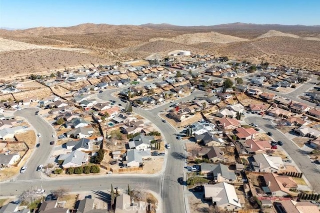 drone / aerial view featuring a mountain view