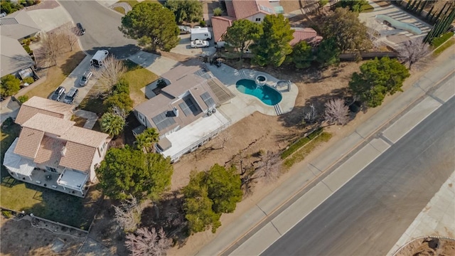 birds eye view of property with a residential view