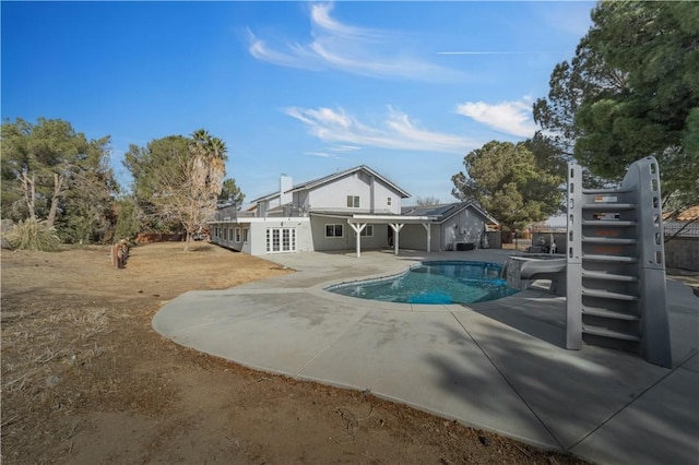 back of house with a patio area