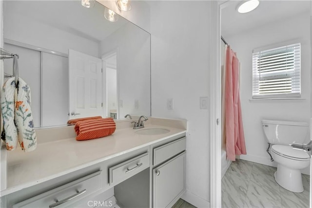 full bath with baseboards, toilet, marble finish floor, and vanity