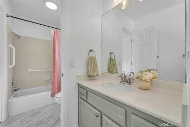 full bath featuring toilet, vanity, and shower / bath combo