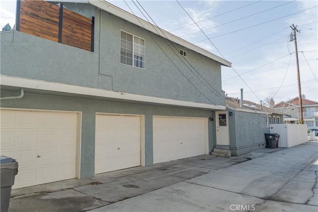 exterior space with a garage