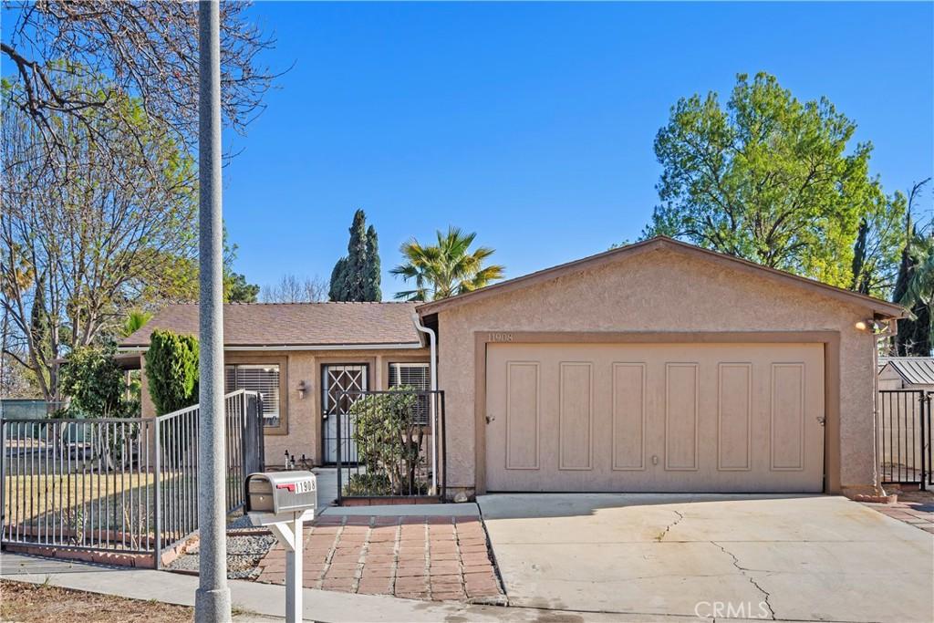 ranch-style home with a garage