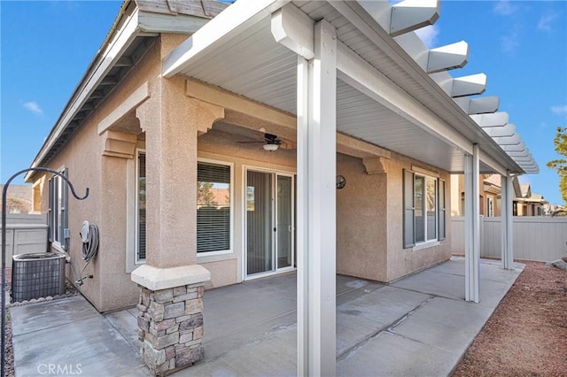 view of patio featuring ceiling fan