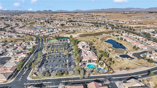 bird's eye view featuring a water and mountain view