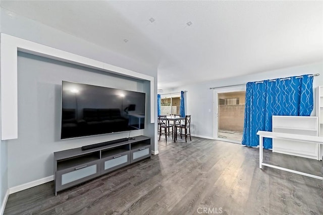 living room featuring dark hardwood / wood-style flooring