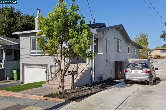 view of front of property with a garage