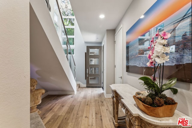 hallway featuring light hardwood / wood-style floors