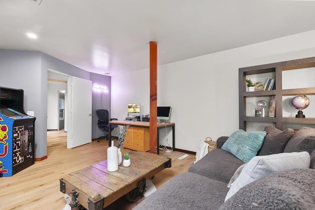 living room with light hardwood / wood-style floors