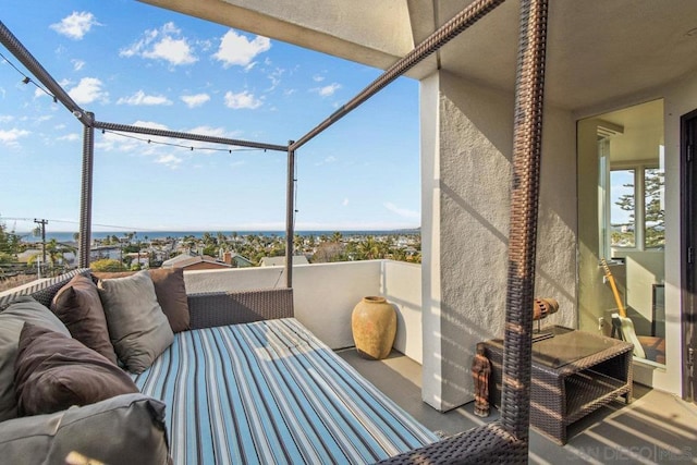 view of patio / terrace with a balcony