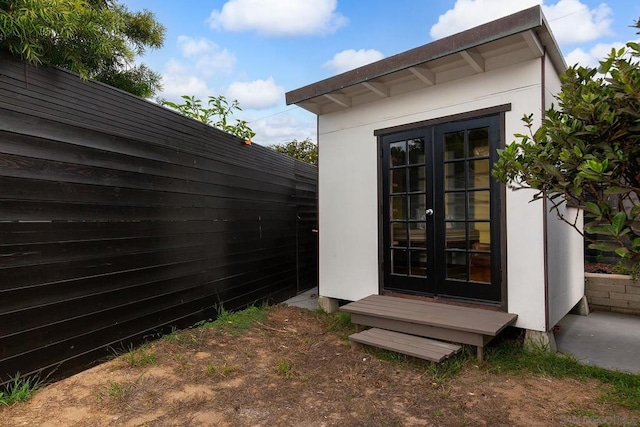 view of outdoor structure with french doors