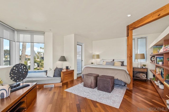 bedroom featuring dark wood-type flooring