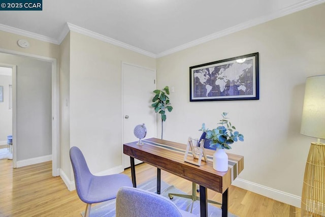 office area with crown molding and light hardwood / wood-style flooring