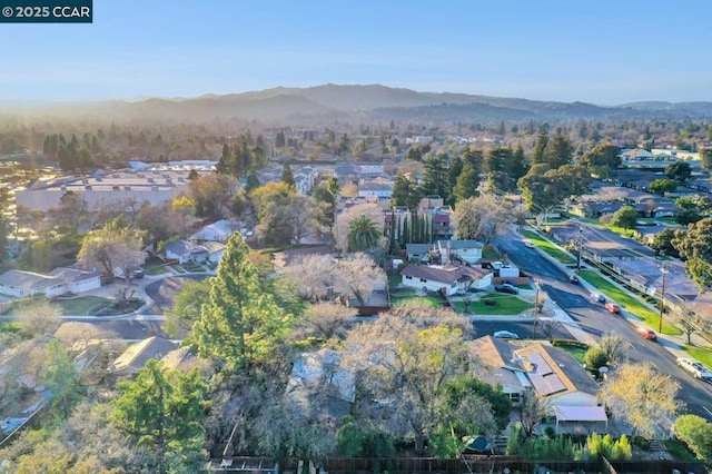 drone / aerial view featuring a mountain view