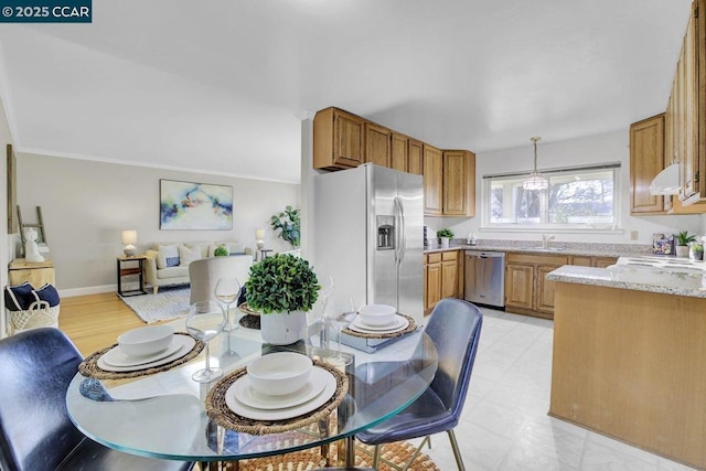 dining area featuring sink