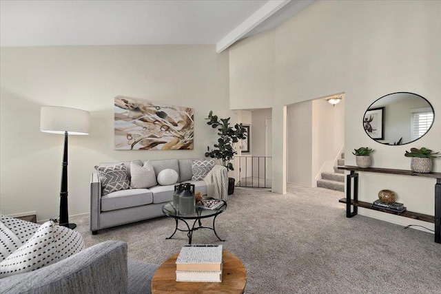 living room featuring beam ceiling, carpet floors, and high vaulted ceiling