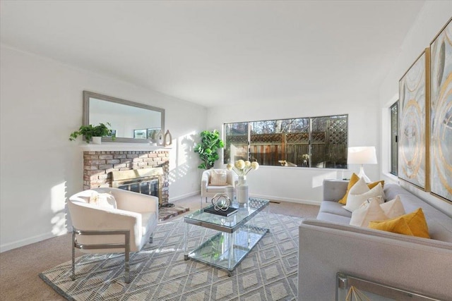 carpeted living room featuring a fireplace