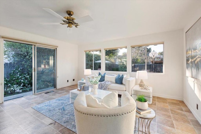 sunroom / solarium with ceiling fan