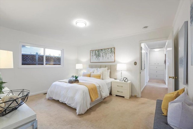 carpeted bedroom featuring ornamental molding