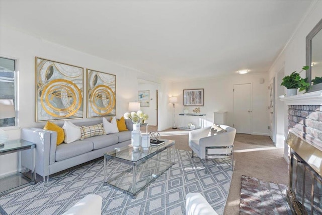 carpeted living room featuring a brick fireplace