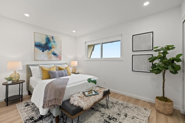 bedroom with light wood-type flooring