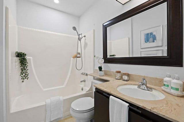 full bathroom featuring vanity,  shower combination, and toilet