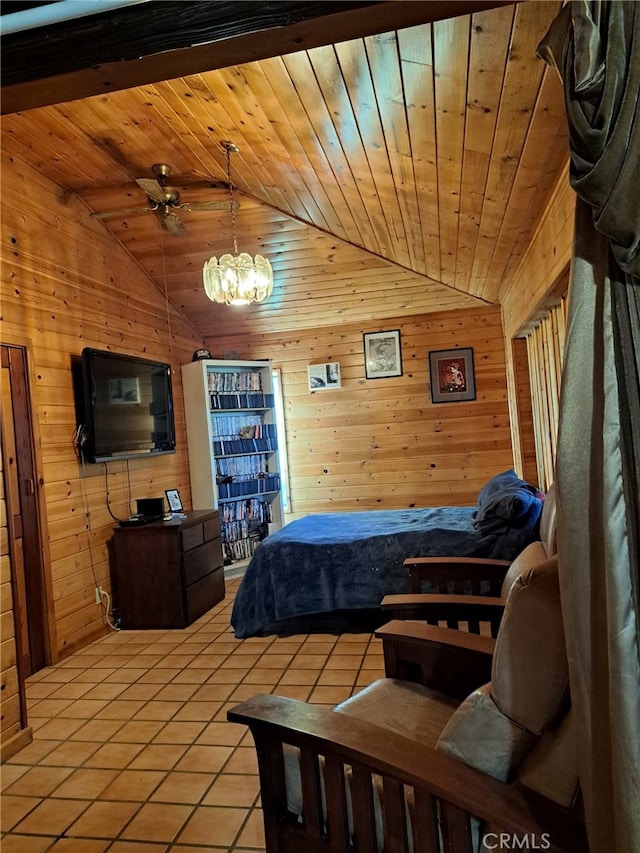 bedroom with wood walls, lofted ceiling, a chandelier, light tile patterned floors, and wooden ceiling