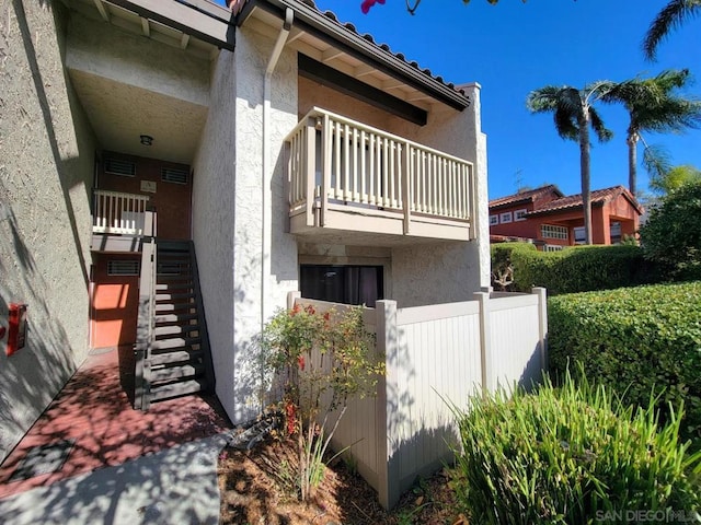 view of property exterior with a balcony