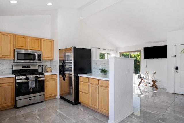 kitchen with tasteful backsplash, appliances with stainless steel finishes, and high vaulted ceiling