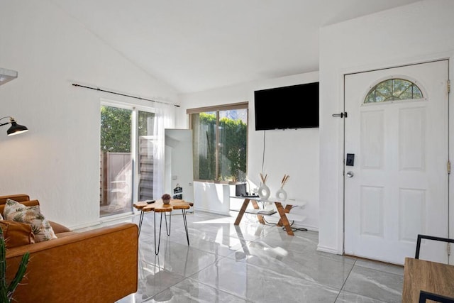 foyer with lofted ceiling