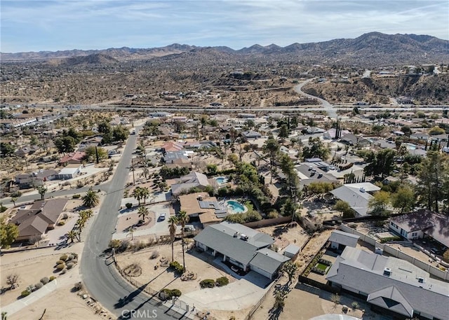 aerial view featuring a mountain view