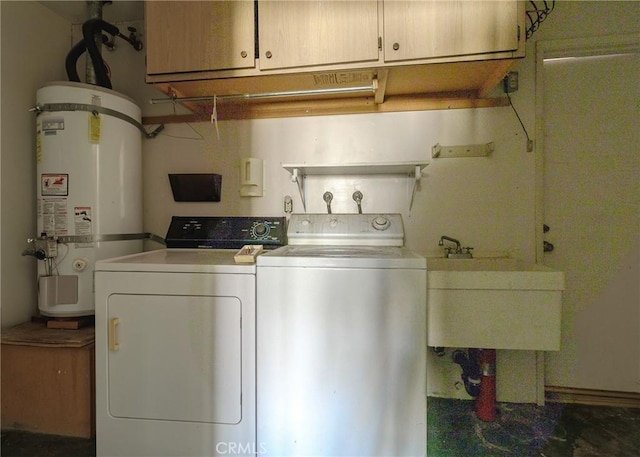 laundry area featuring strapped water heater, sink, cabinets, and independent washer and dryer