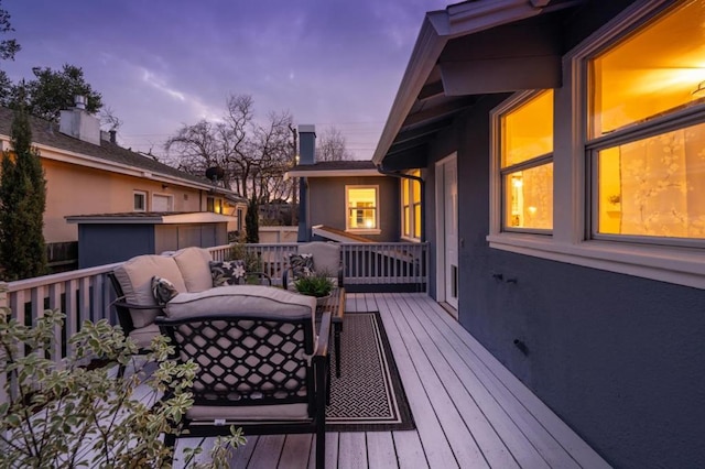 view of deck at dusk