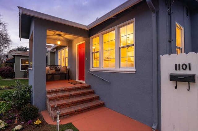 view of property exterior at dusk