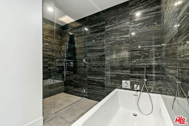 bathroom featuring tile walls and tile patterned flooring