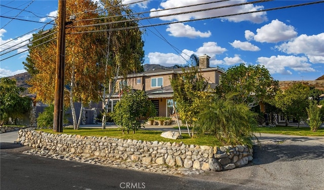 view of front of home with a front yard