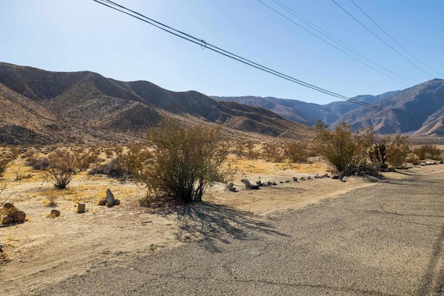 view of mountain feature with a rural view