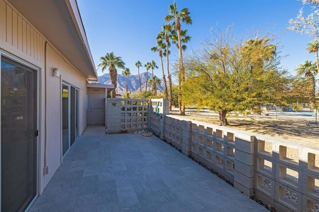 view of patio with a mountain view