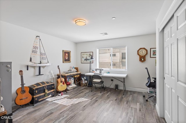 office area with hardwood / wood-style floors