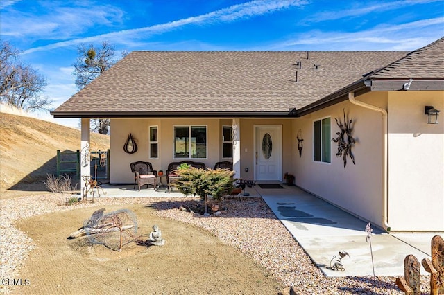 view of front of property featuring a patio