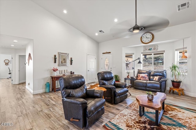 17600 Ascot Ct, Tehachapi, CA 93561 - living room featuring a ceiling fan, light wood finished floors, high vaulted ceiling, and recessed lighting