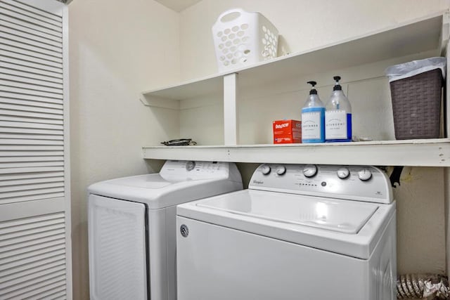 laundry room with washer and dryer