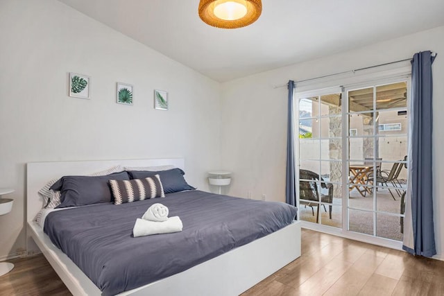 bedroom with wood-type flooring